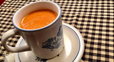 A cup of tomato soup.