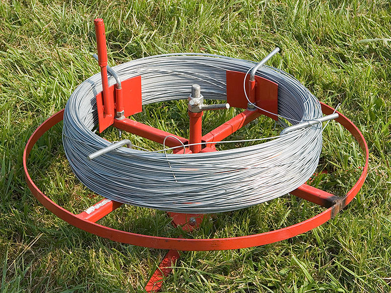 Spool of high-tensile woven wire